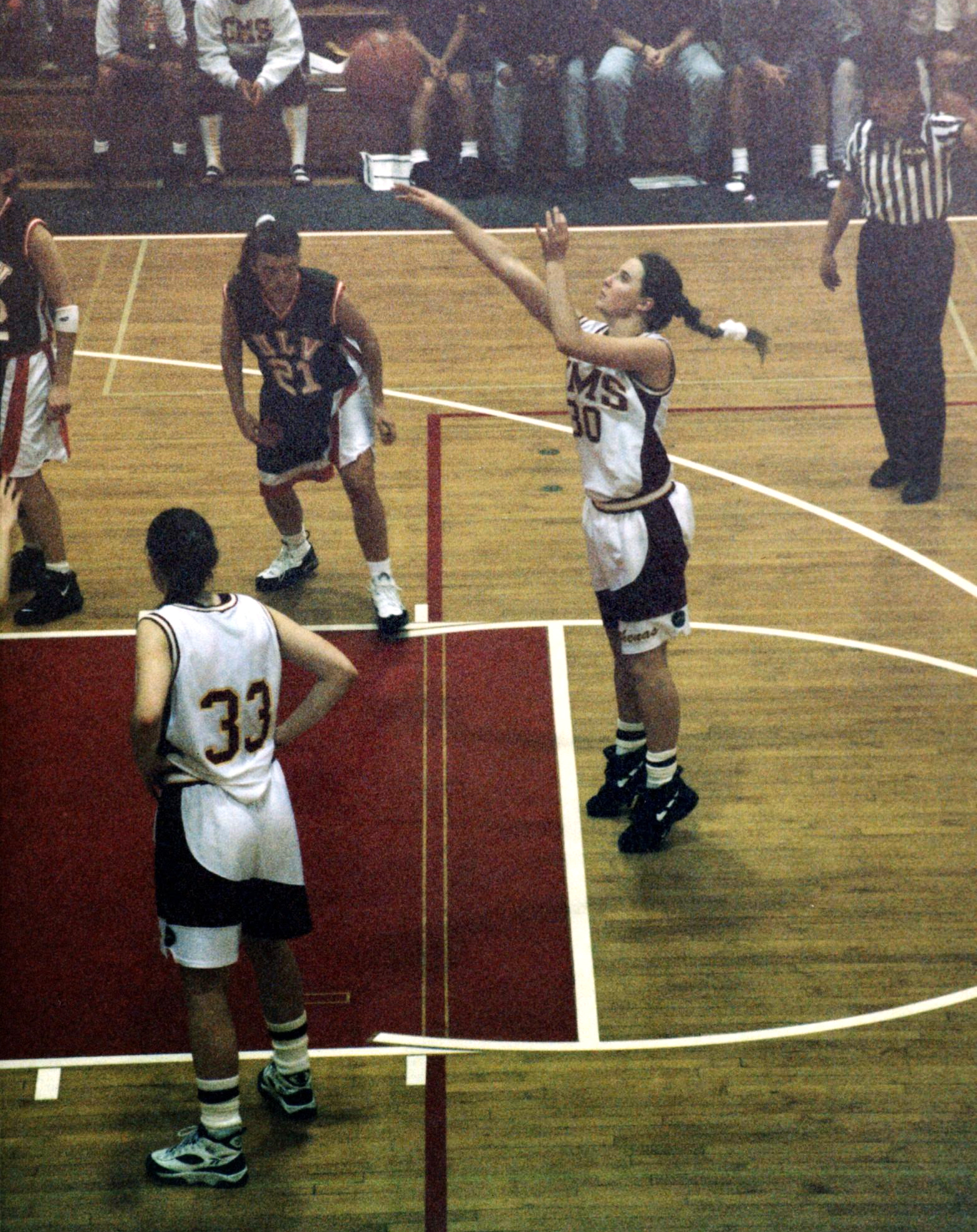 'DT' Graves in action on the basketball court during her undergraduate years.