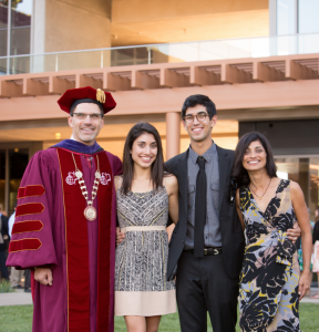 The Family Chodosh: (from left) CMC's president, daughter Saja, son Caleb, and CMC First Lady Priya Junnar in front of the Kravis Center. 