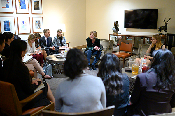 Samantha Powers chats with a group of CMC students