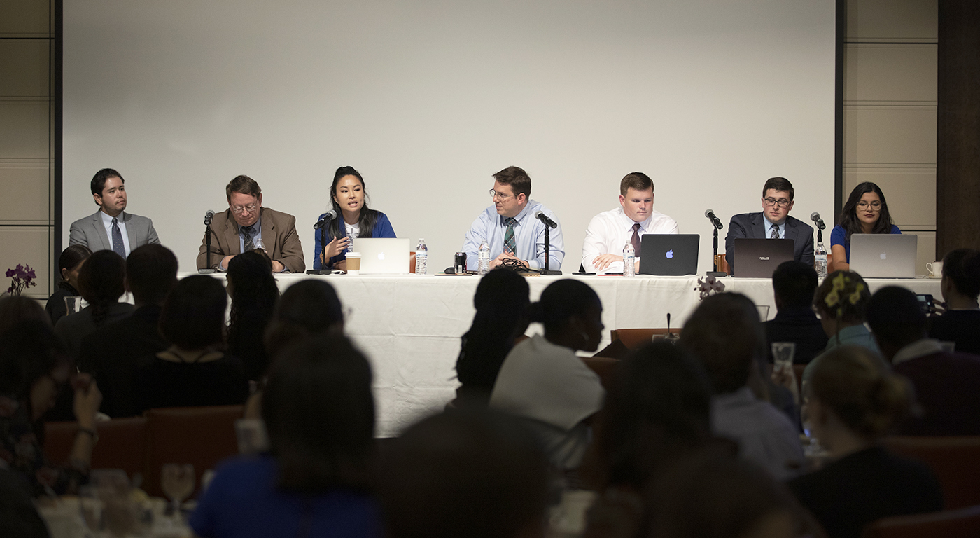 A panel of students and faculty discuss election results during an event at the Athenaeum in 2018.