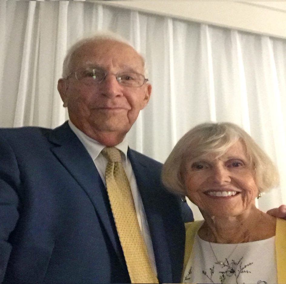 A closely cropped, recent photo of Peter Adams ’61 with his arm around wife, Rebecca 'Becky' Scripps ’61