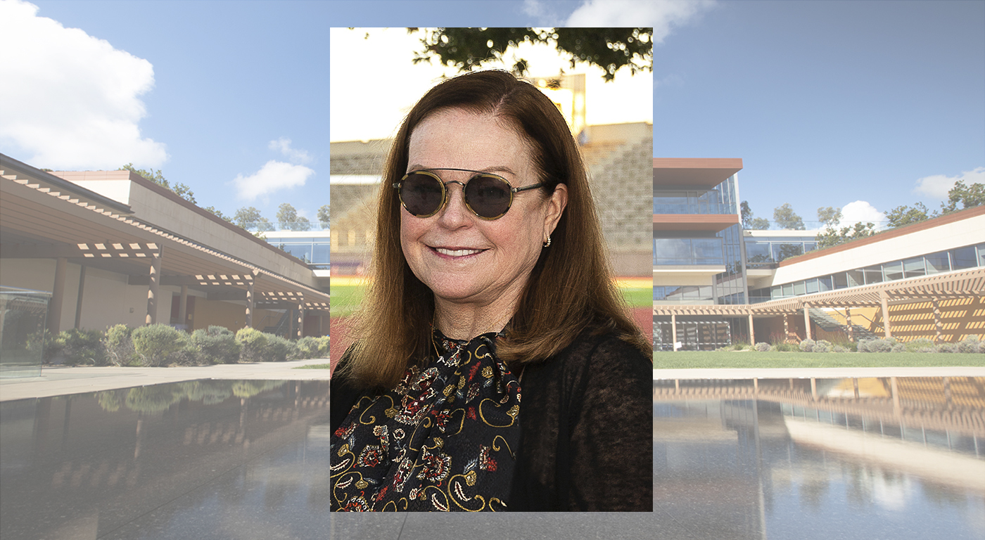 Portrait of Donna Wengert Neff P'21 in sunglasses, superimposed over a washed out photo of the Kube.
