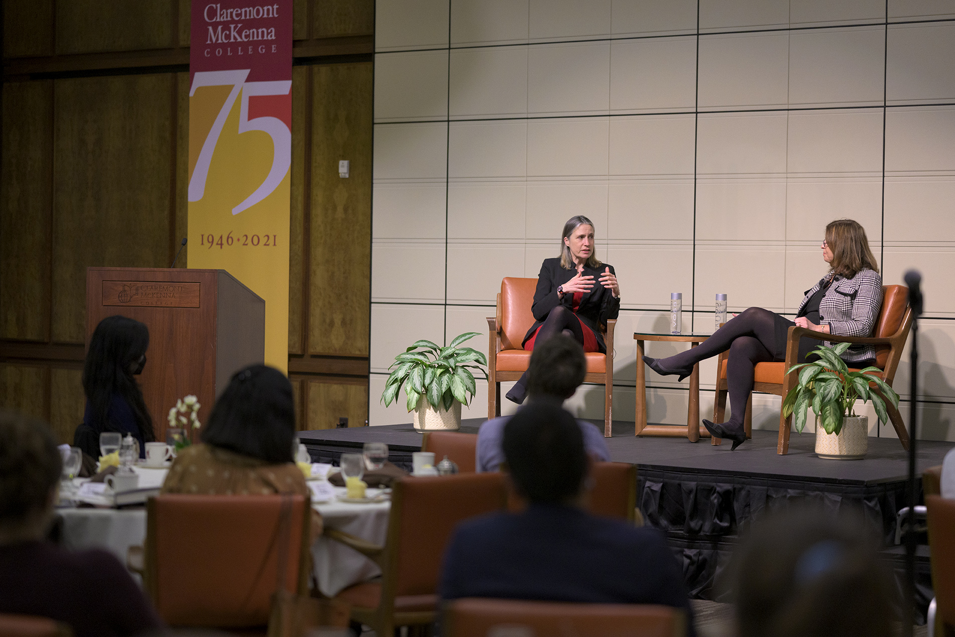 A closer shot of the stage and head table inside the Ath during Fiona Hill's speaking portion.