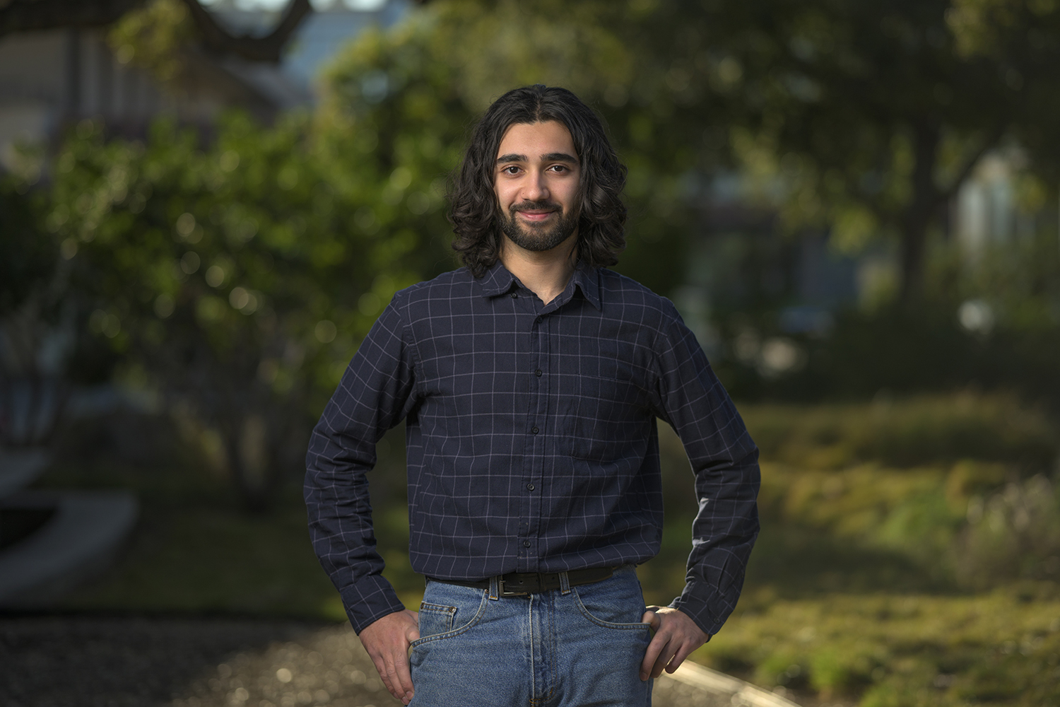Portrait of Wali Shaikh '24, Seaver Scholar, on campus.