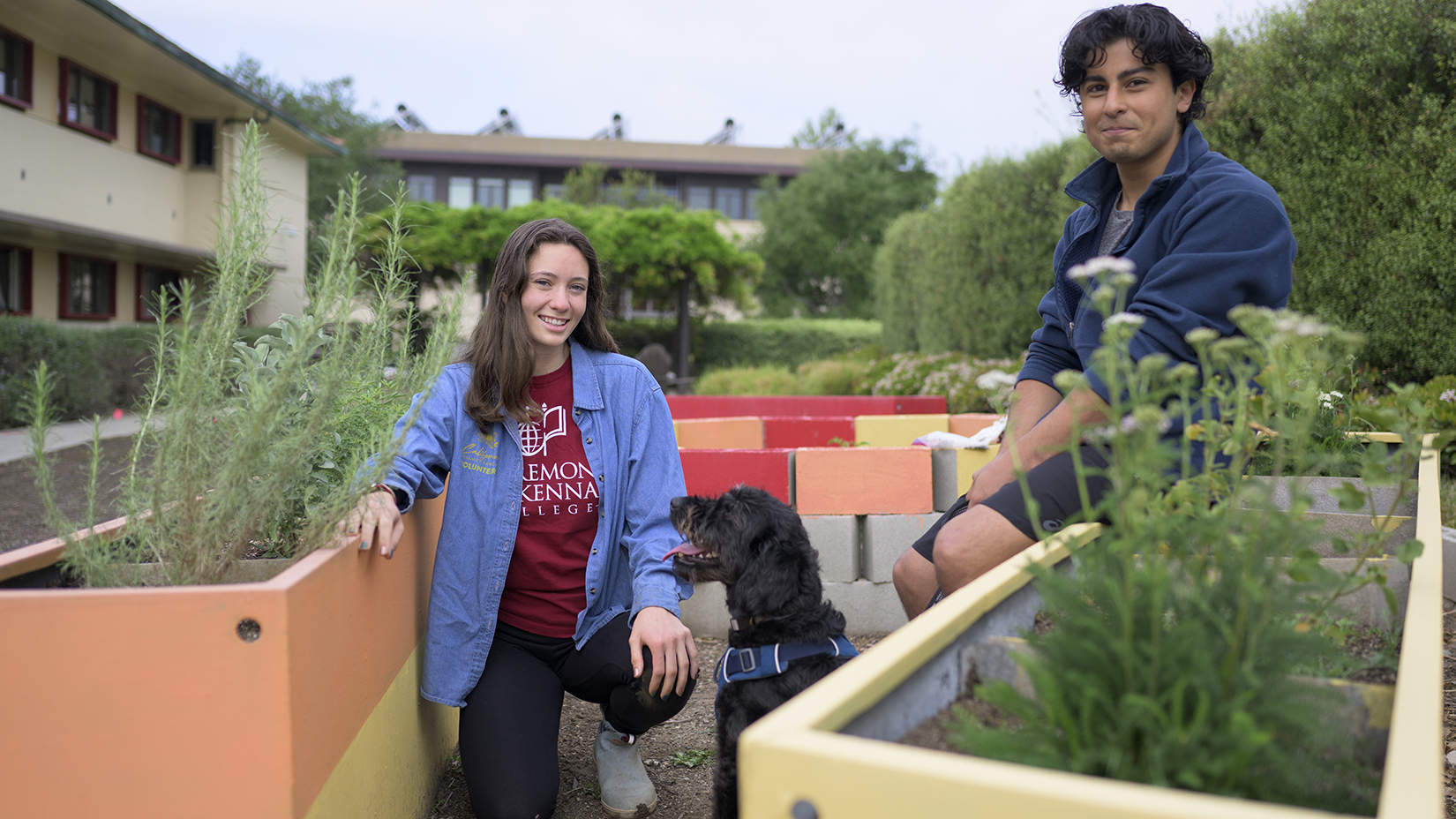 Elmir Kouliev ’24 and Zoe Carlson ’22 in the garden near Beckett Hall