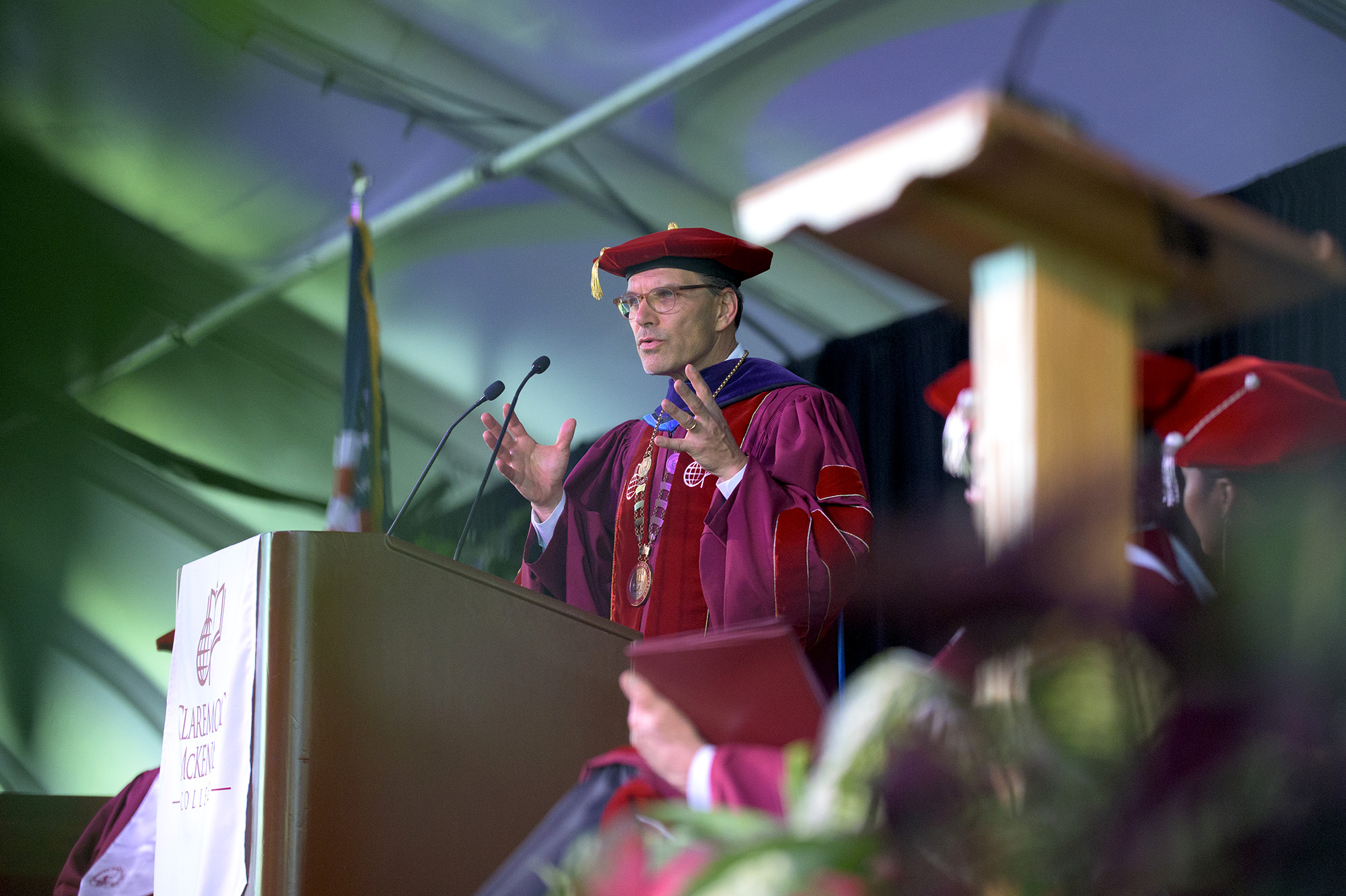 President Chodosh at the podium during CMC's 2022 Commencement.