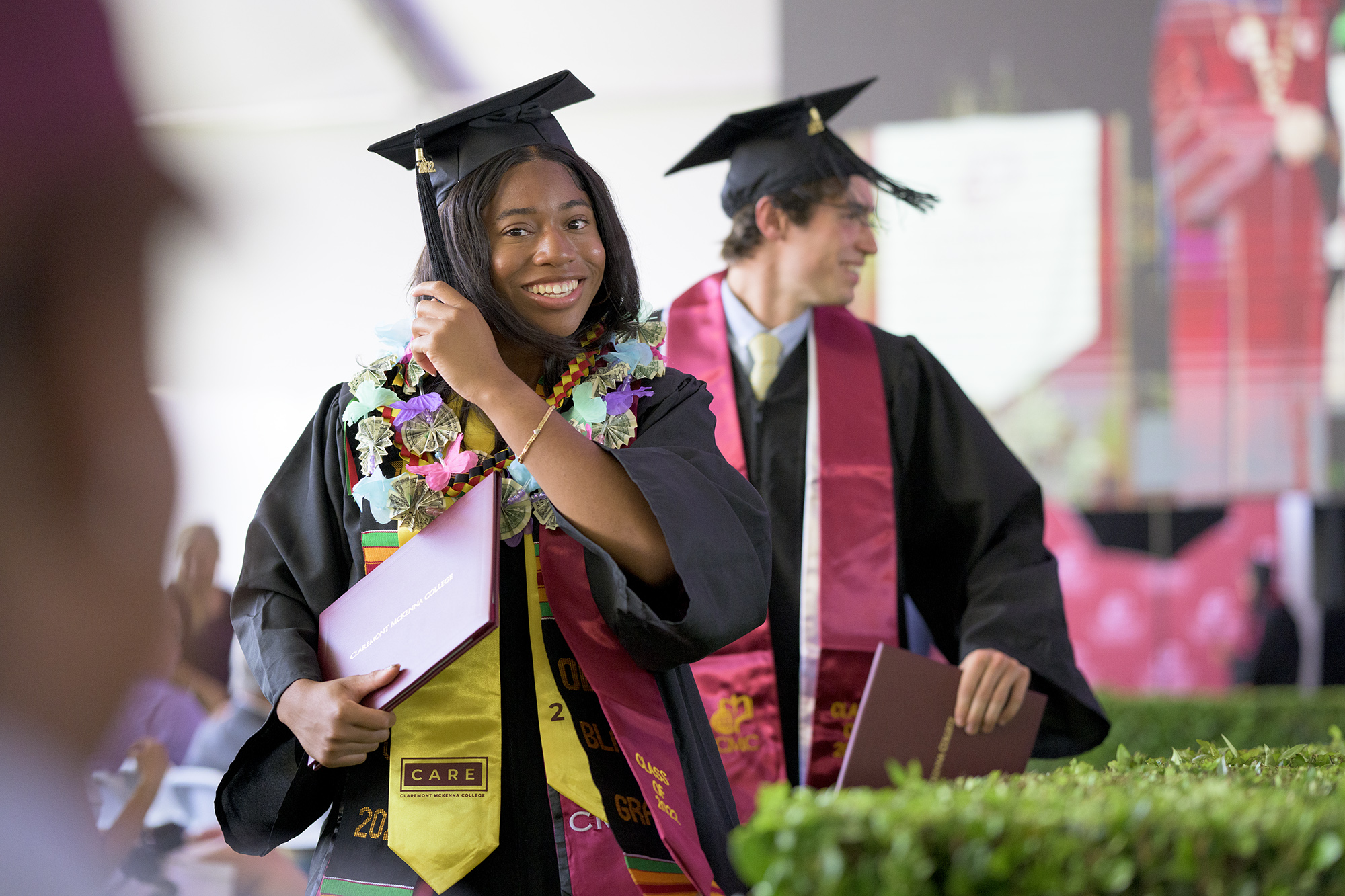 Senior Class President Sobechukwu Tanitoluwa Minna-Masala Oreoluwa Uwajeh, photographed going back to her seat after receiving her diploma.