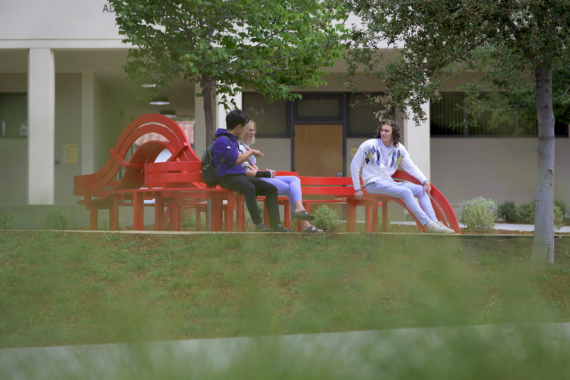 Students explore the brand new benches installed on campus together.