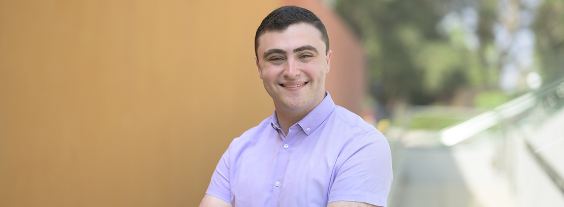 Samuel Bogen ’23 photographed outdoors near the Kravis Center on campus.