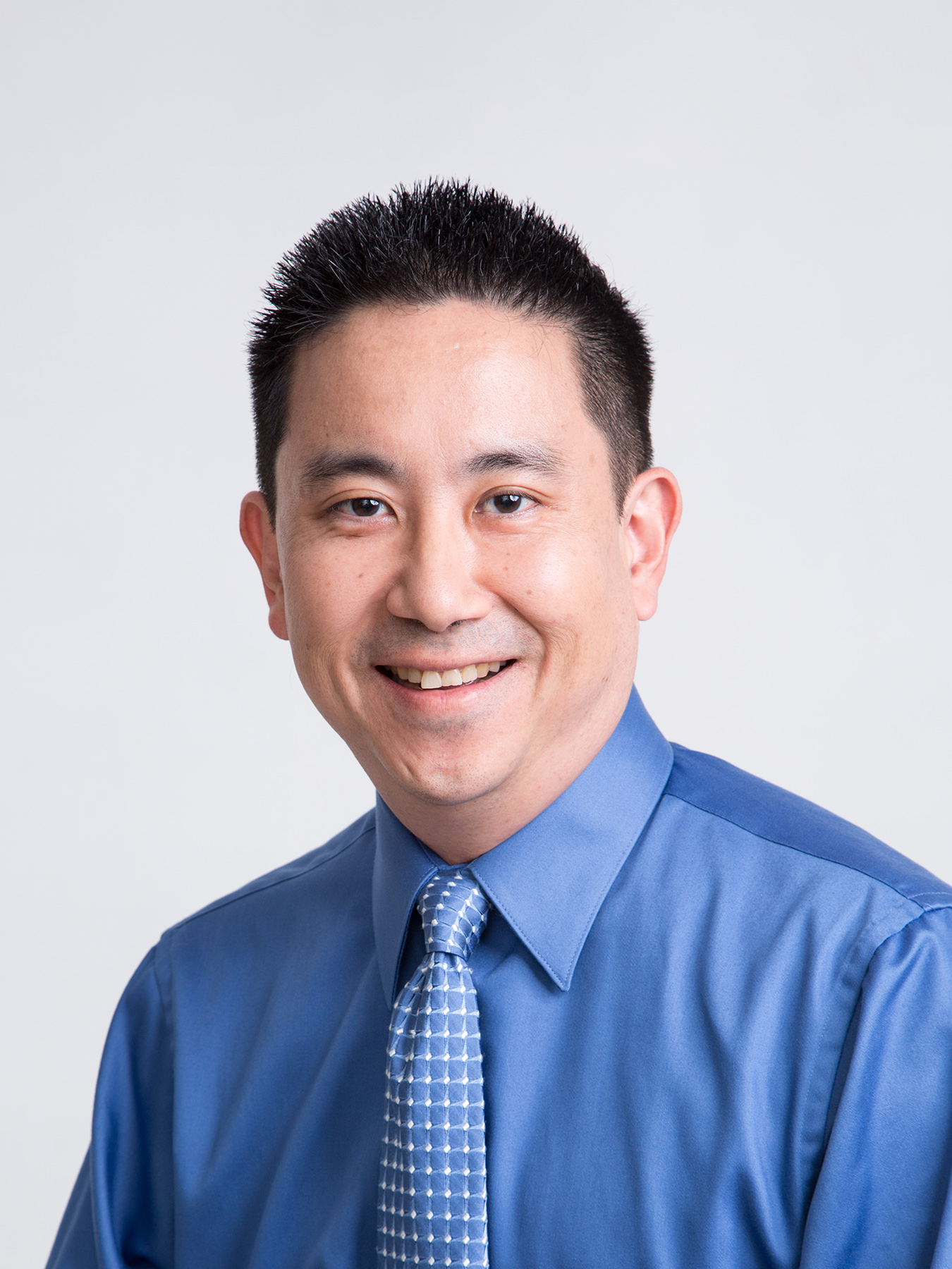 Professional portrait of Eric Fujimoto ‘93.