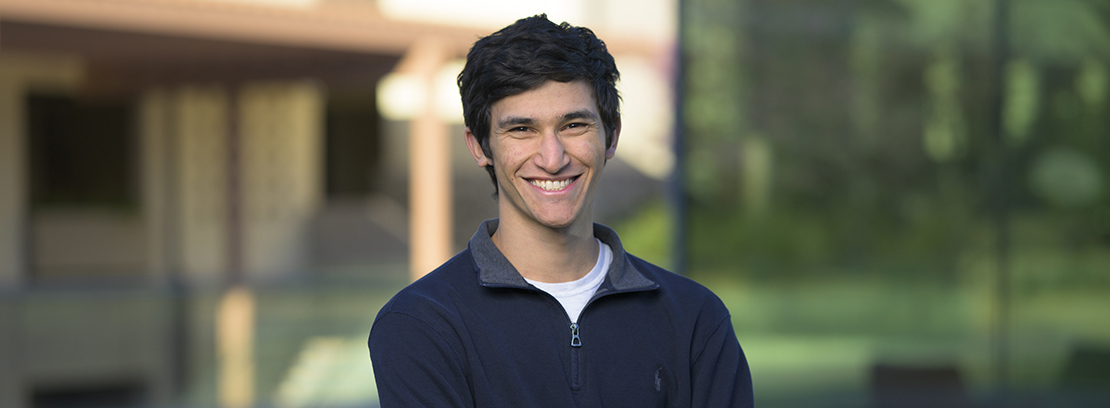 Nicolas De Mello ’23 photographed on campus in front of the Kube.