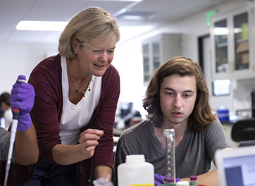 Professor of Biology Emily Wiley with a student.
