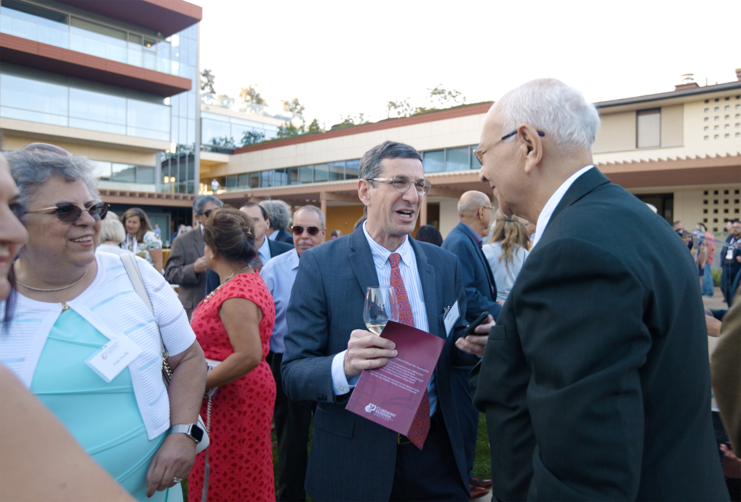 Prof. Massoud greets the guests who have come out for his reception and naming ceremony.