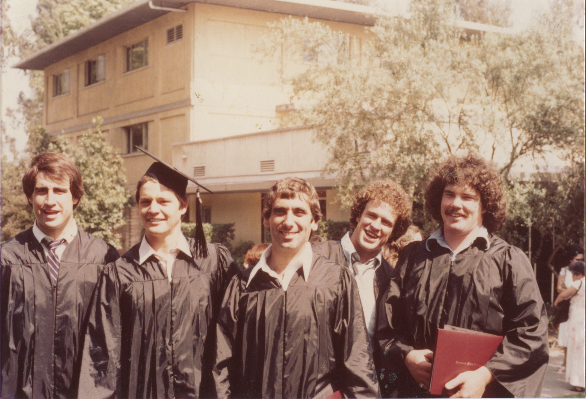 Augie Nieto with classmates at CMC's 1980 Commencement.
