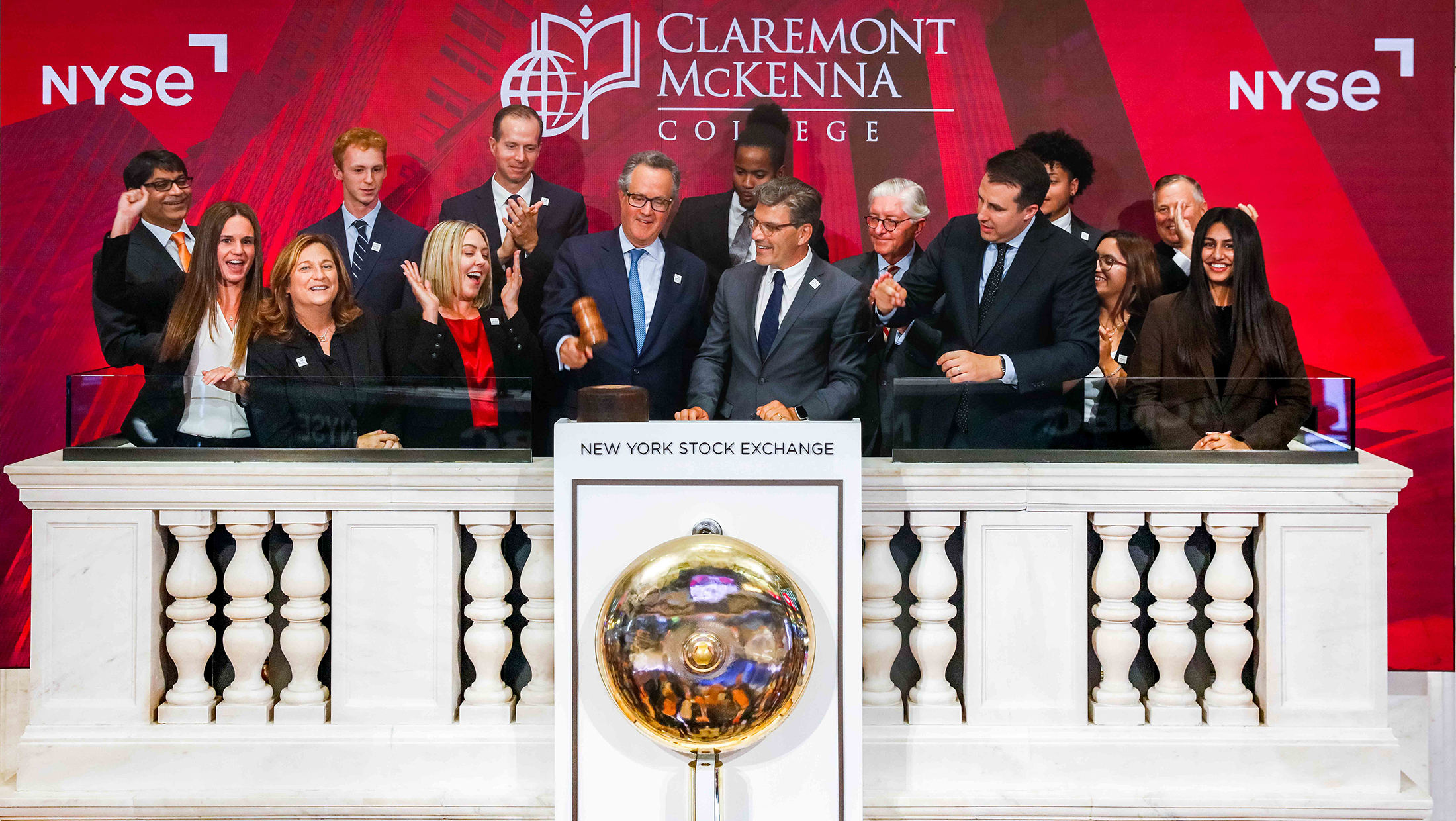 Students, President Chodosh, and Claremont McKenna College representatives at the New York Stock Exchange.