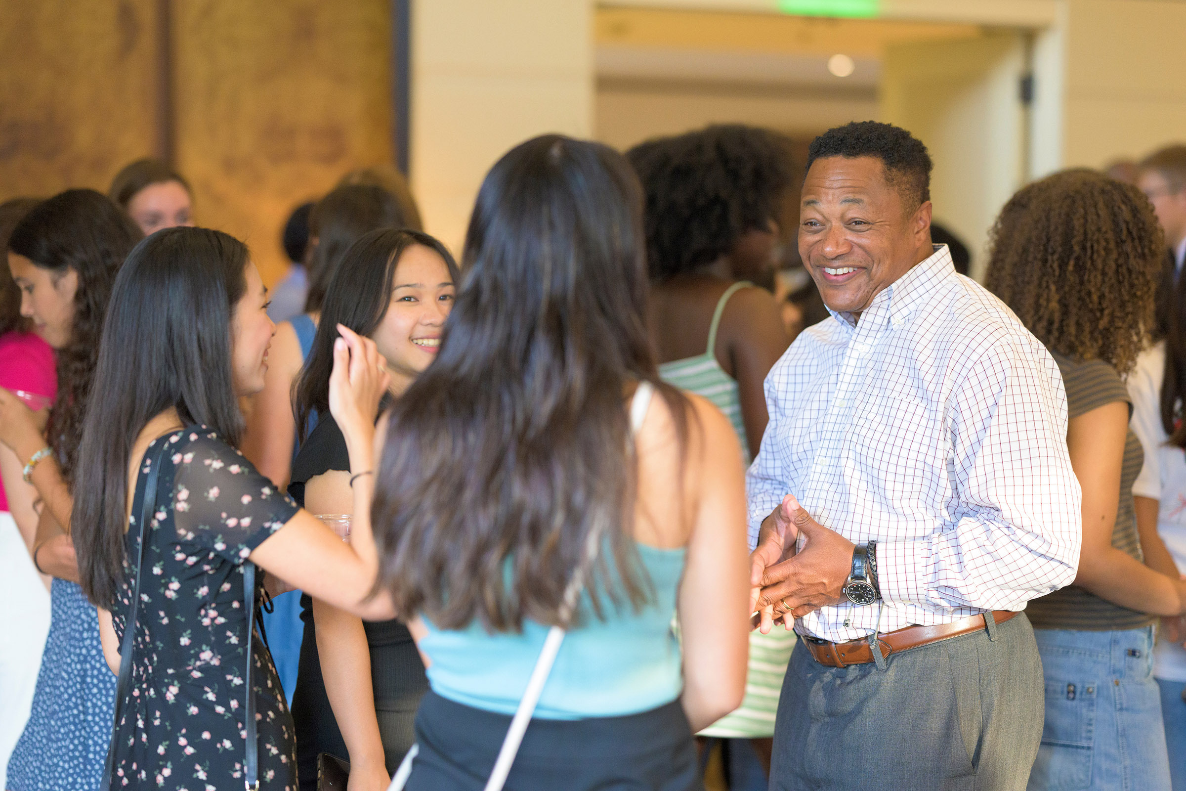 Vernon Grigg with students at the Athenaeum.