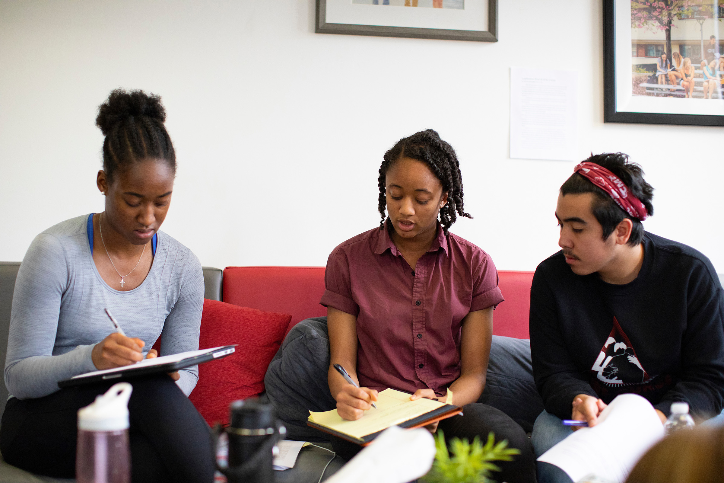 Three students working together.