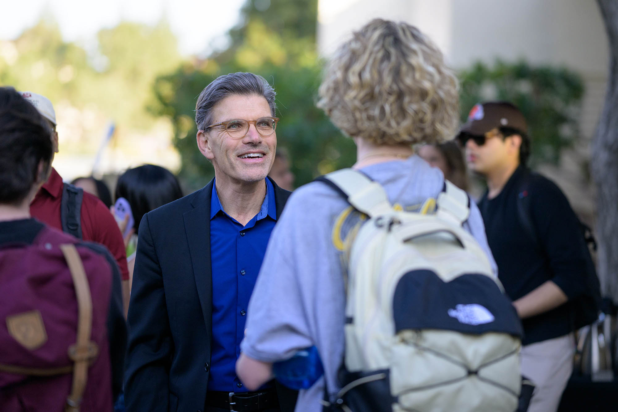 President Chodosh and a student at the first Ath Tea of the Spring Semester.