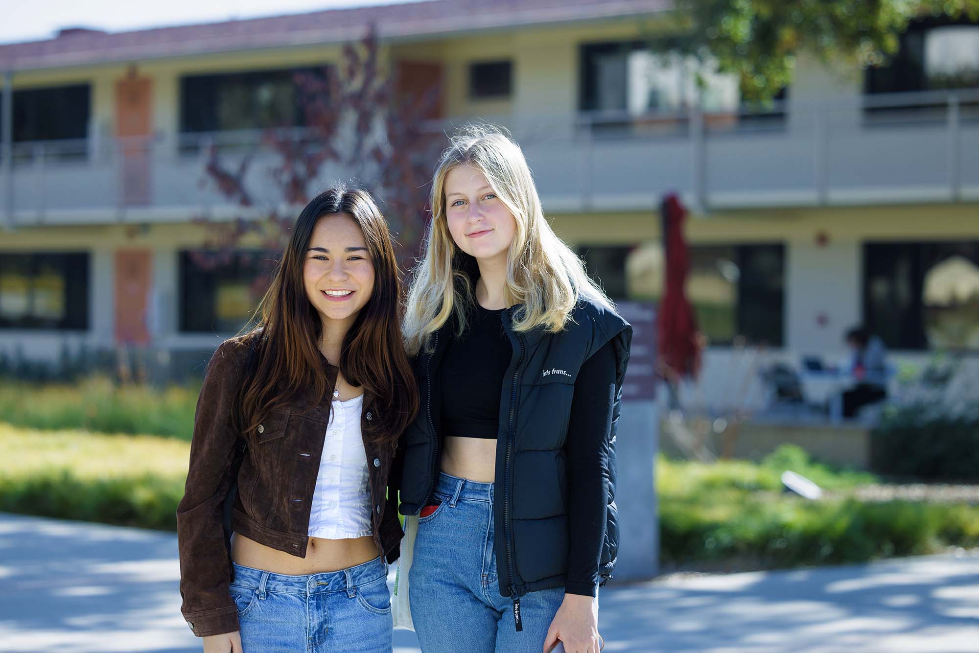 Two female students posing together.