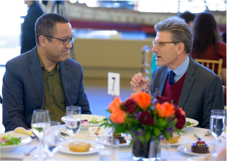 President Chodosh (right) with John McWhorter.