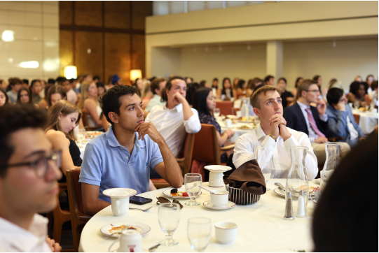 Students watch and discuss the September Presidential debate