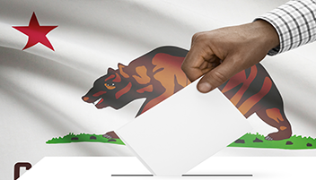 Flag of CA behind ballot box