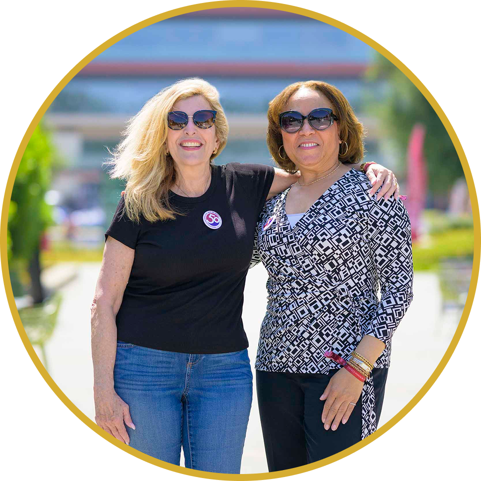Mari Adam ’80 (left) and Lorraine Bains ’88