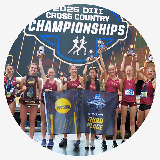 The Athenas cross-country team celebrates victory at the NCAA championships.