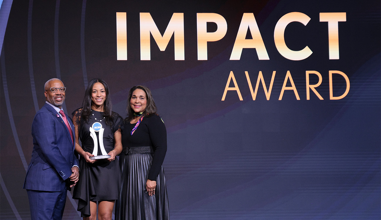 Ella Brissett ’25 and her parents at the NCAA Convention.