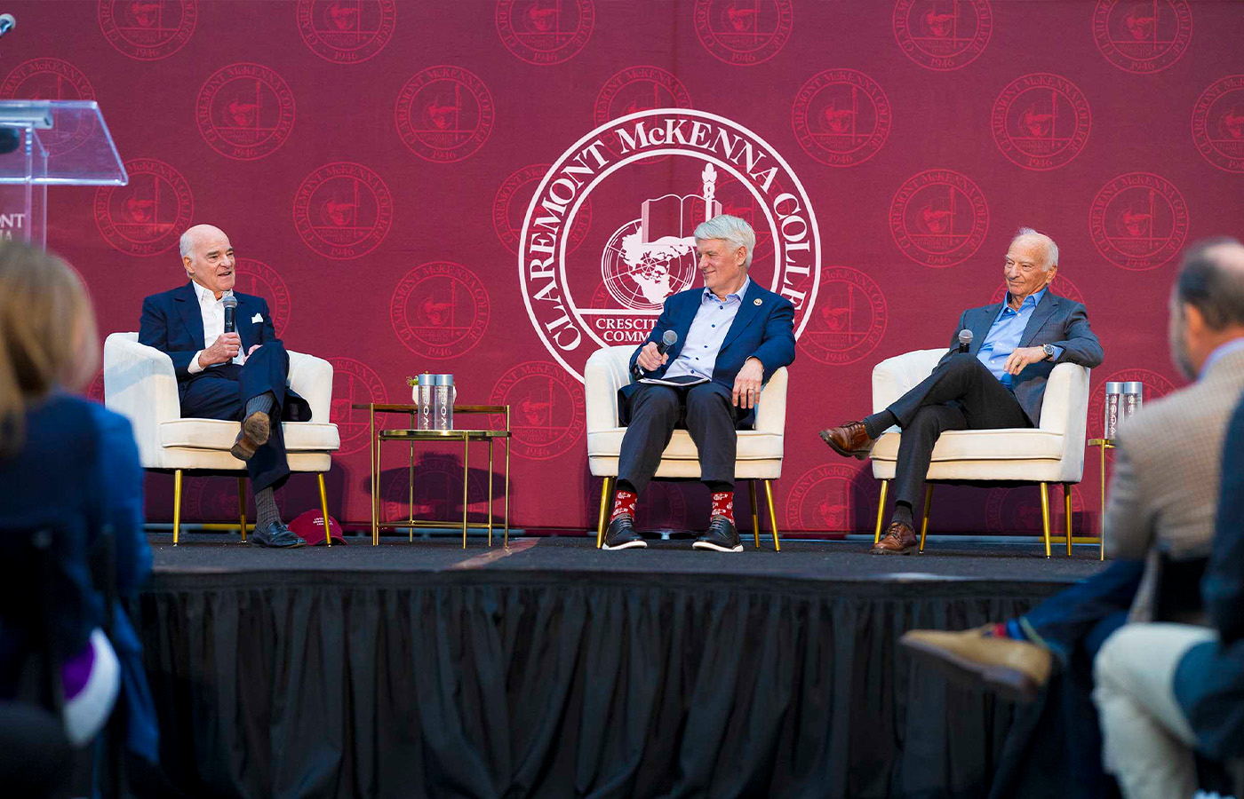 Henry Kravis ’67 (left) and George Roberts ’66 P’93 (right) share their insights during The Summit. CMC Trustee Chair Ken Valach ’82 moderated.