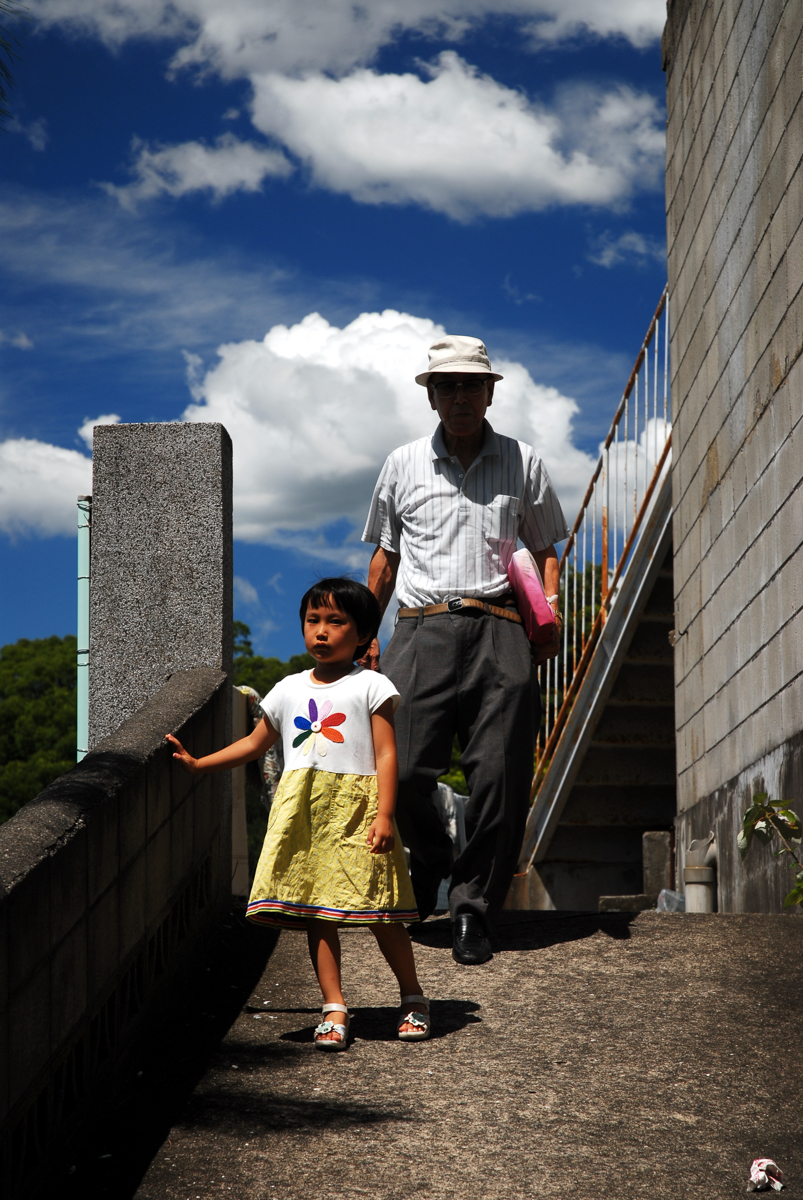 Elderly Japanese man with granddaughter