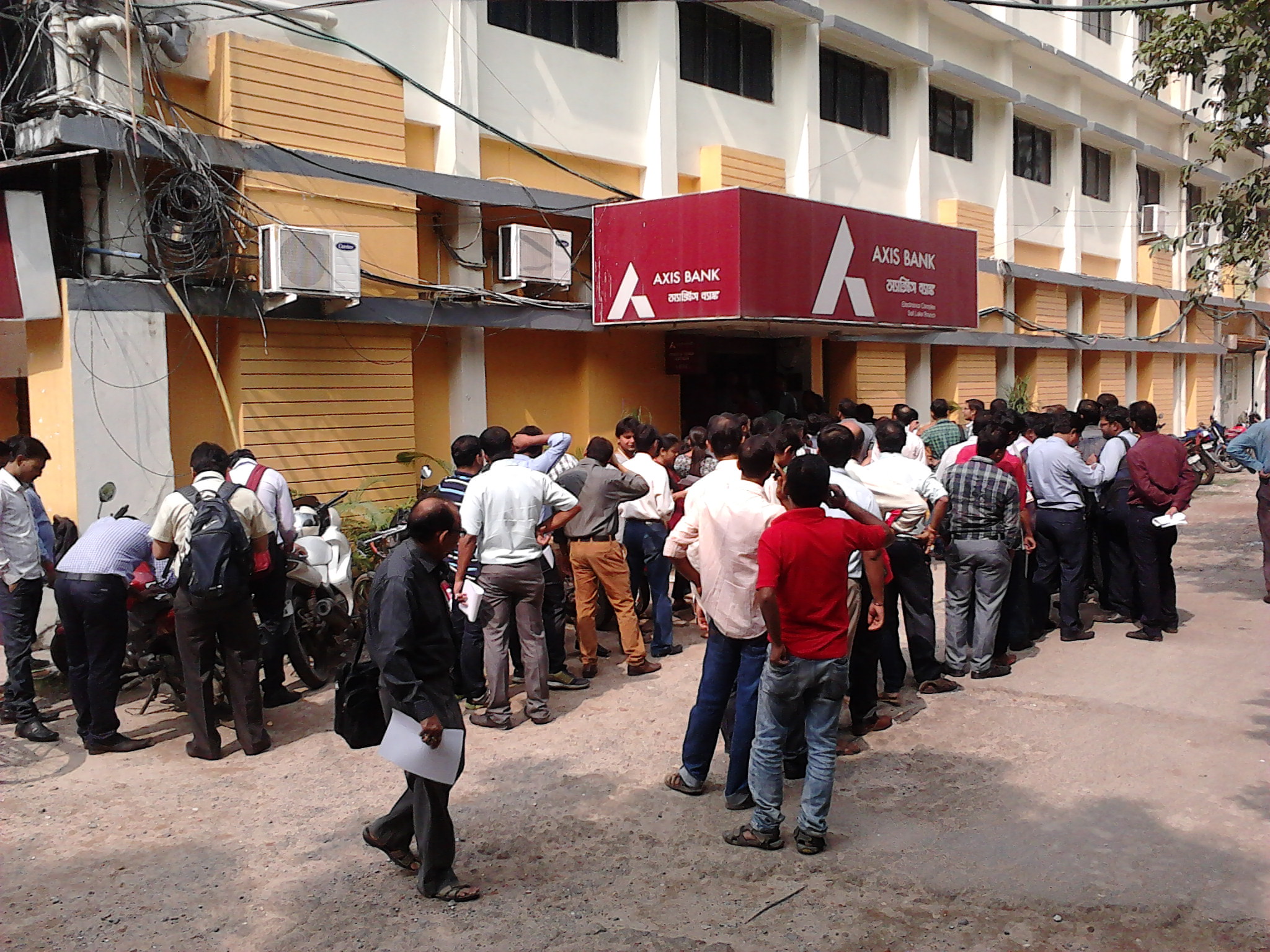 People queueing outside a private bank in Kolkata