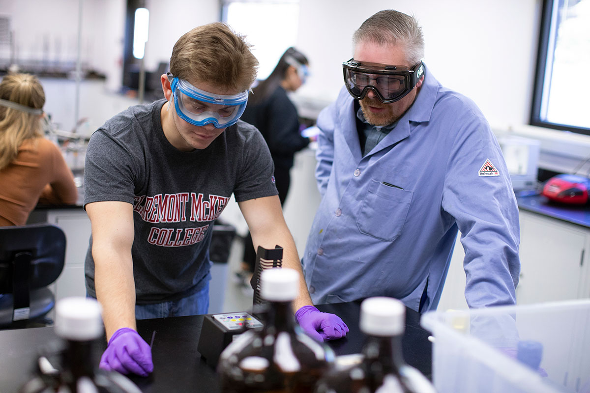 Student and professor in lab