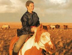 Katherine Krey riding on a pony