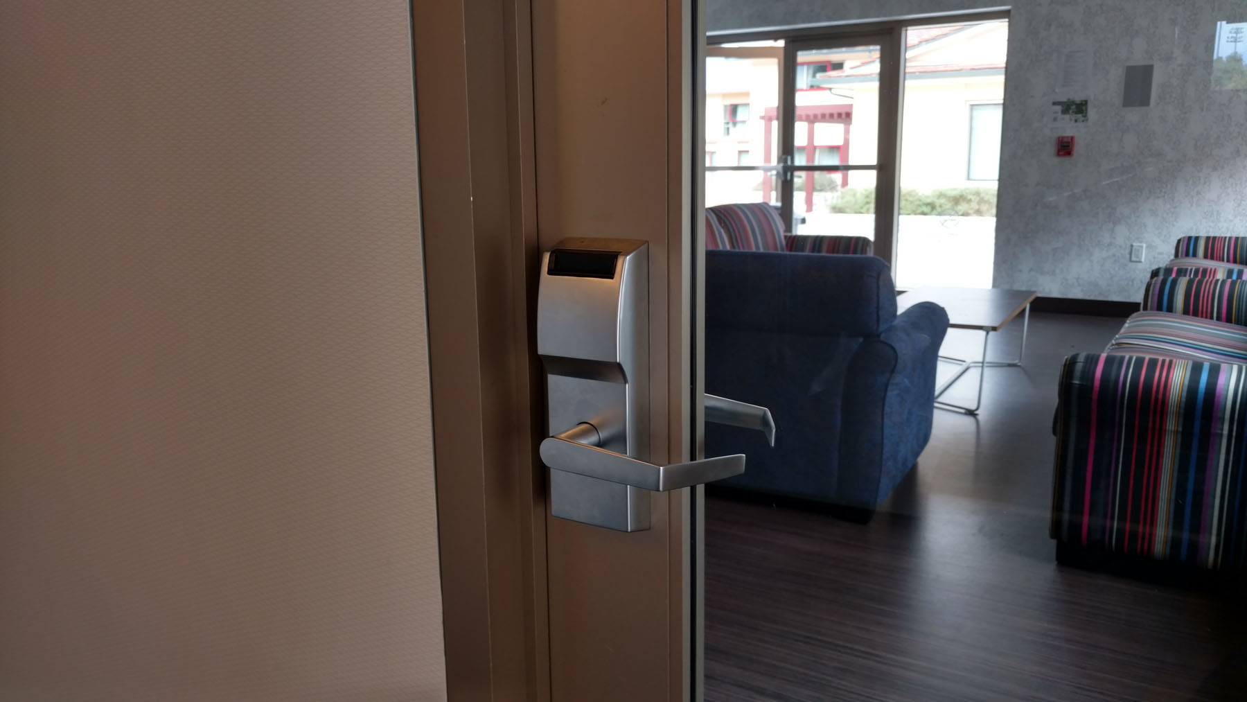 Electronic door lock to common room area