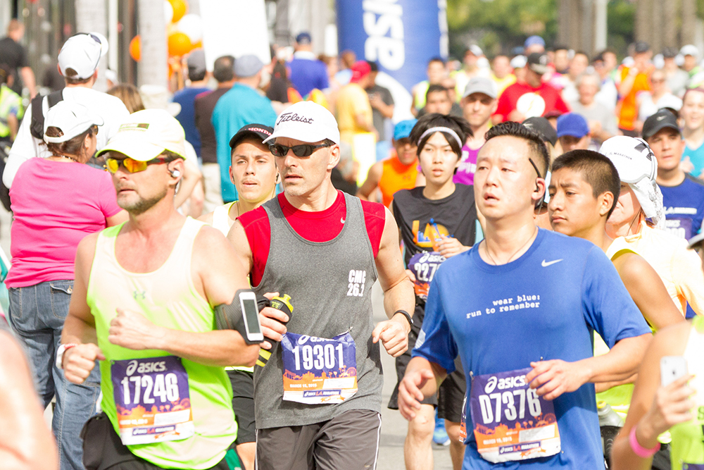 CMC President Hiram Chodosh (center) during this year's LA Marathon