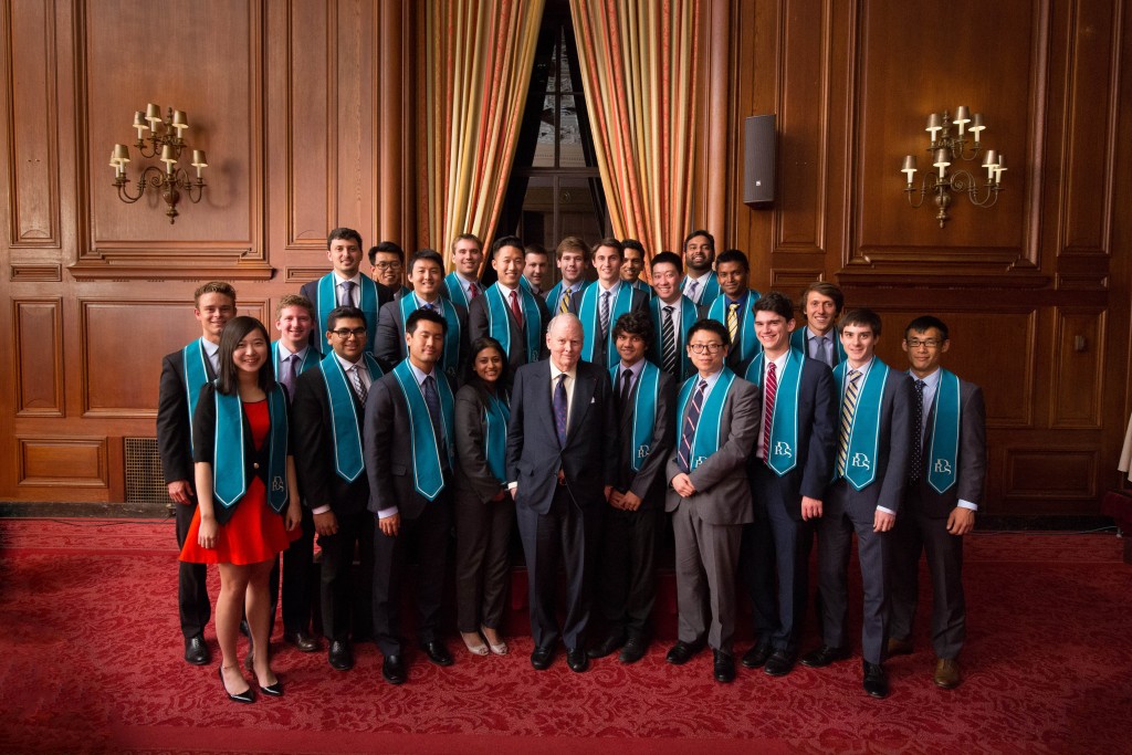 Robert Day Scholars from the Master’s Program in Finance Class of 2015 pose with Robert Day.