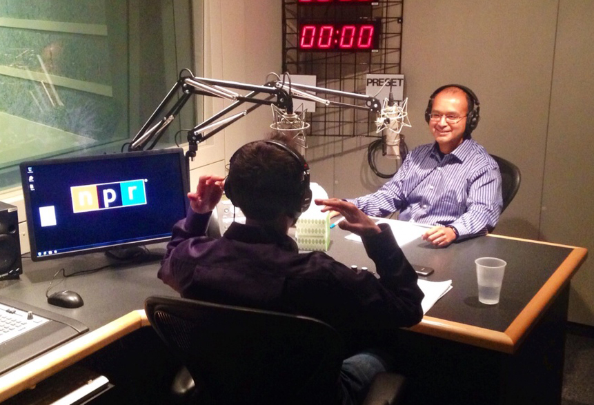 Ananda Ganguly with CGU professor Joshua Tasoff (back turned) in the NPR West studio