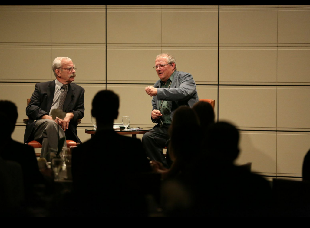 EUROPEAN CHALLENGES: Adam Michnik (right) discusses the political climate in Eastern Europe with a large Athenaeum audience (pictured on left: translator Josef Sobelman). Photo credit/William Vasta