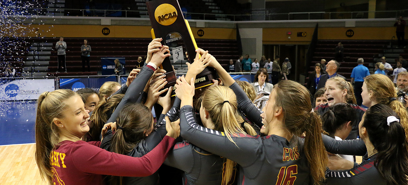 Athena volleyball celebrates with national trophy