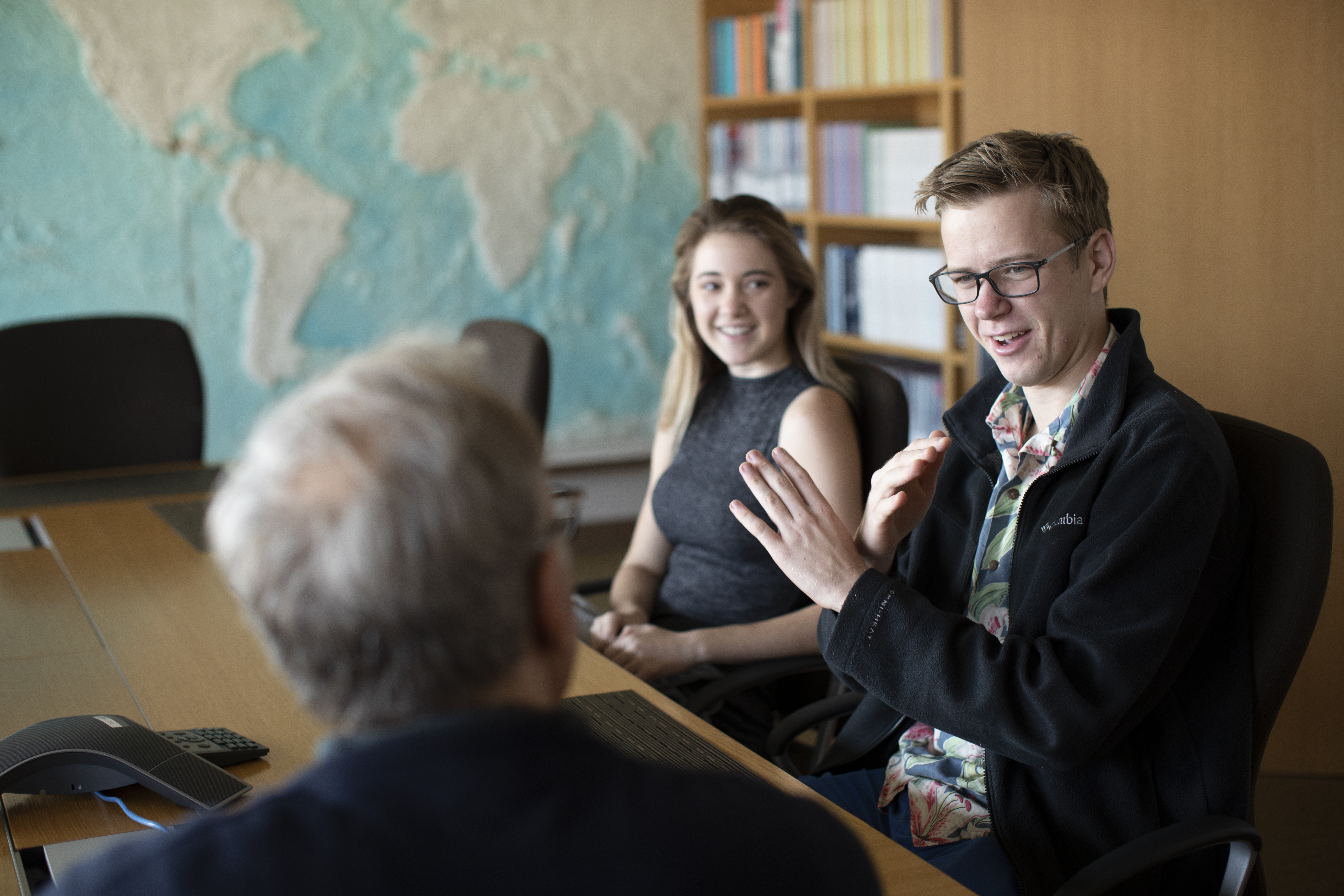 Students participating in a seminar on capitalism