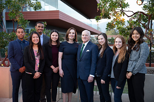 Henry Kravis and attendees of the KLI 25th Anniversary dinner 