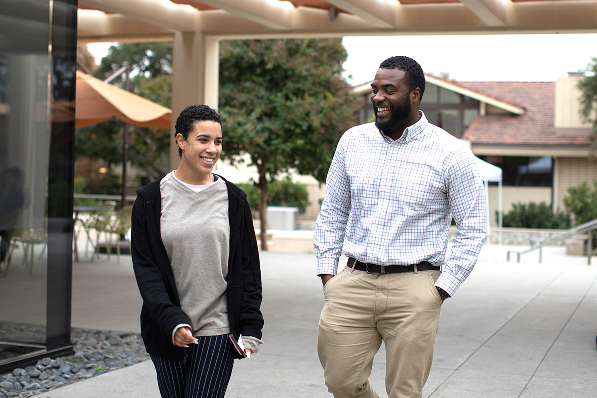 Vince Greer with a student