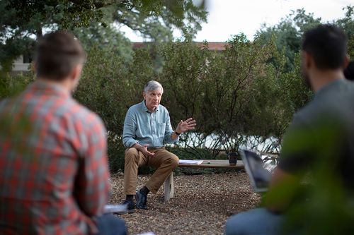 Professor Warner teaching outside