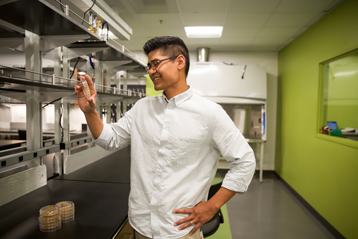 Pete Chandrangsu, assistant professor of biology, in a lab (Courtesy of Scripps College)