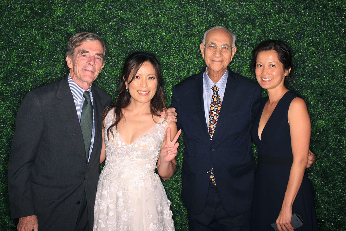 CMC Prof. Marc Massoud (pictured second from right) celebrating with Stella Ho ’97 at her wedding, along with CMC Prof. James Taylor and alumna Julie Chen Woo ’97.