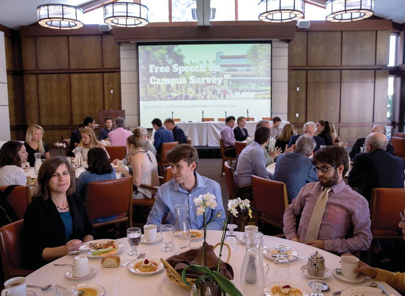 students and professors at the conference