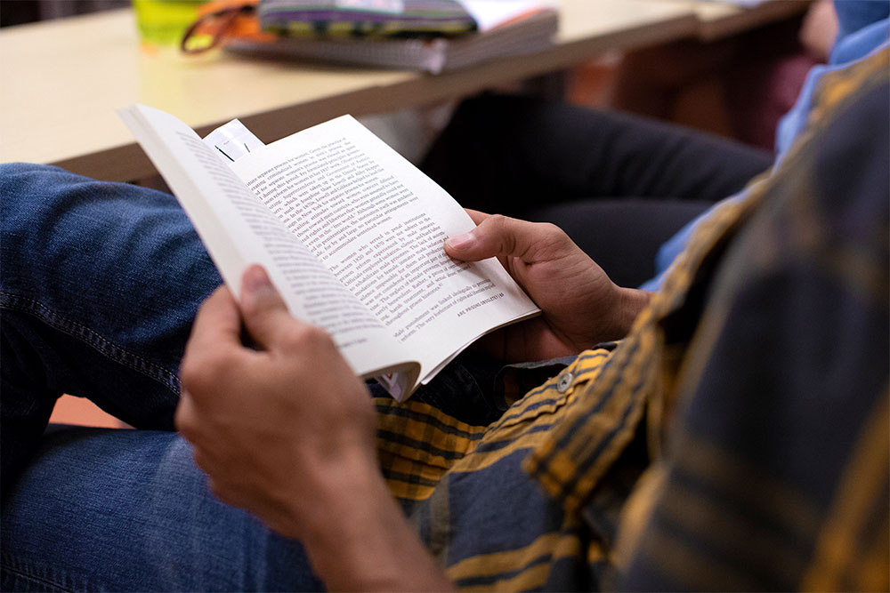 Student reading a book