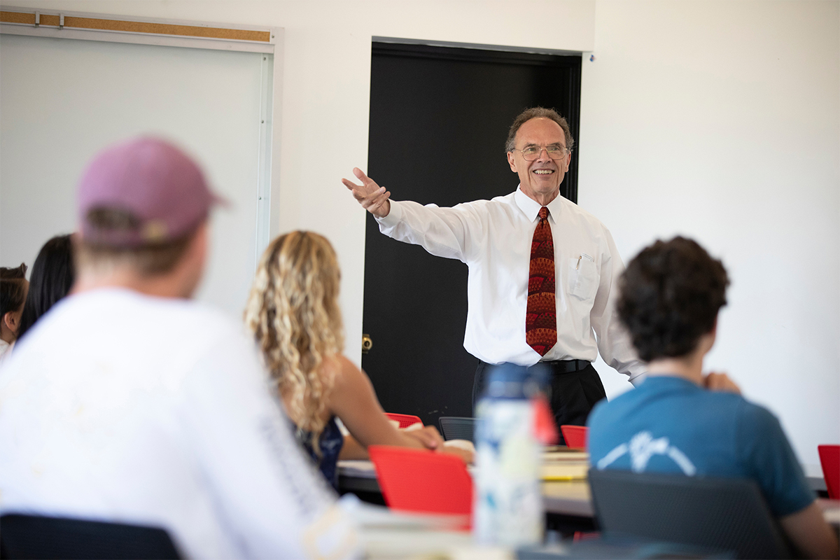 professor with students in the lab