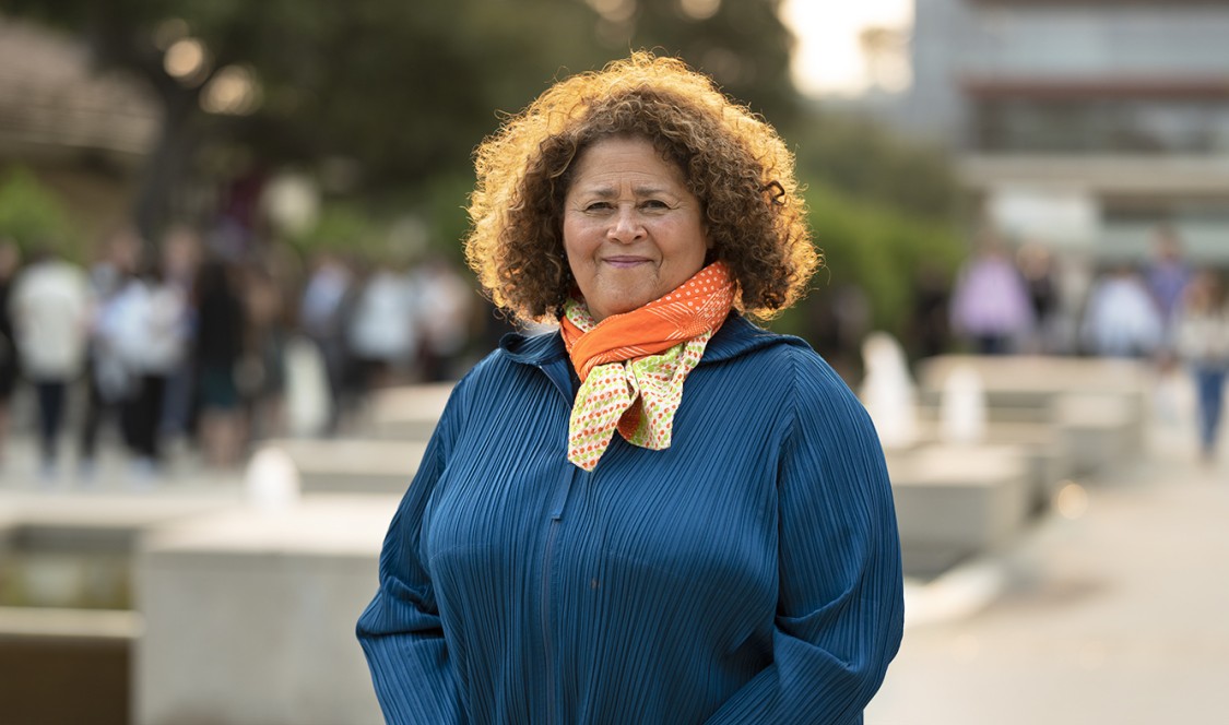 Anna Deavere Smith smiles for the camera outside of the Athenaeum